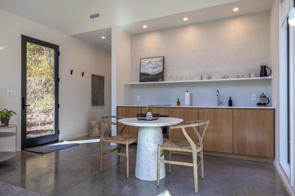 Well-appointed kitchenette includes an induction cooktop and fresh eggs from the coop