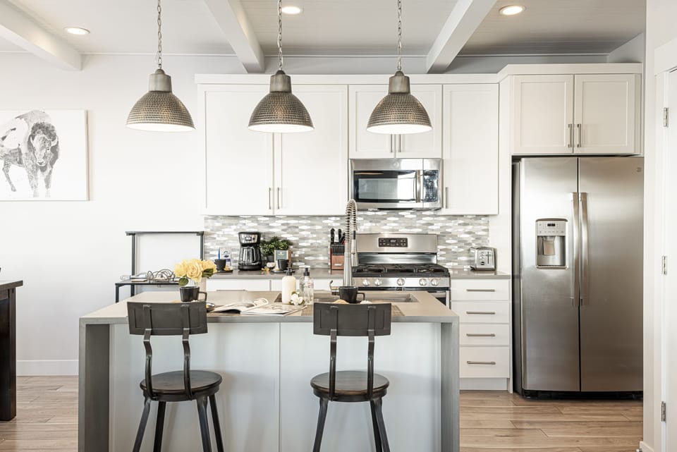 Fully Equipped Kitchen with Island and Bar Stools for Two