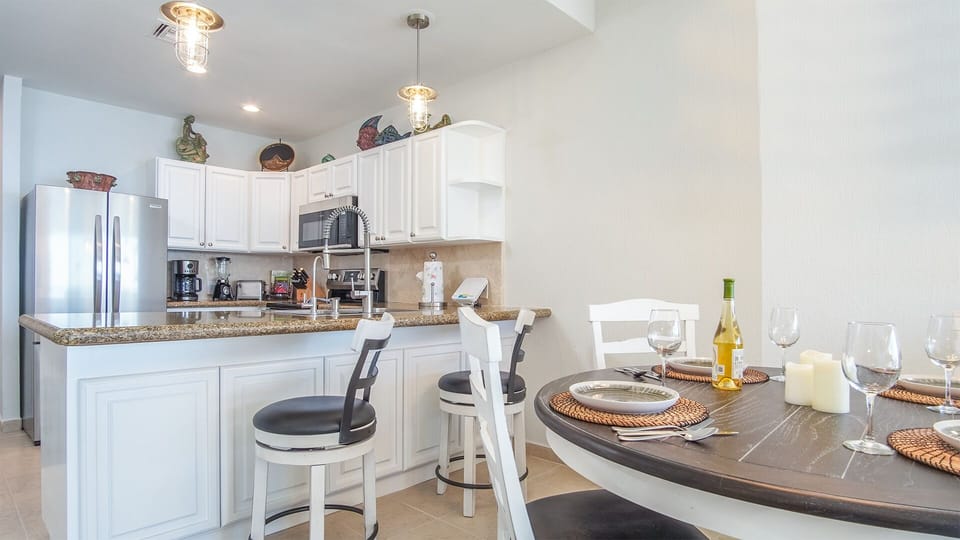 The kitchen and dining table all set.