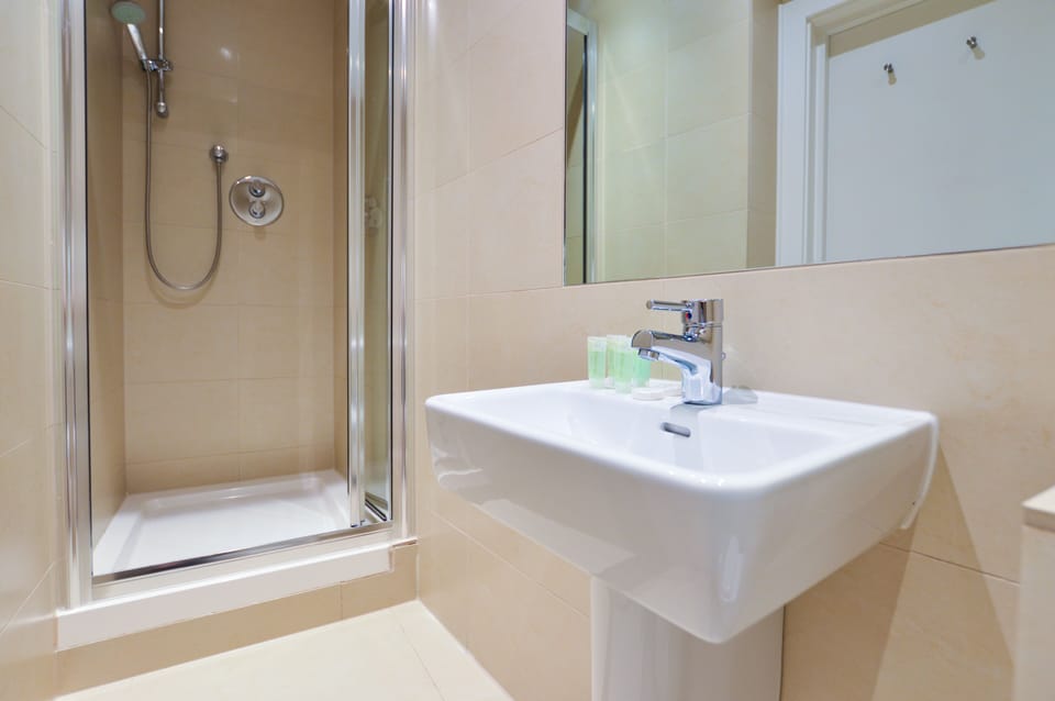 Standard Studio Apartment | Bathroom | Shower, free toiletries, hair dryer, heated floors (bathroom)