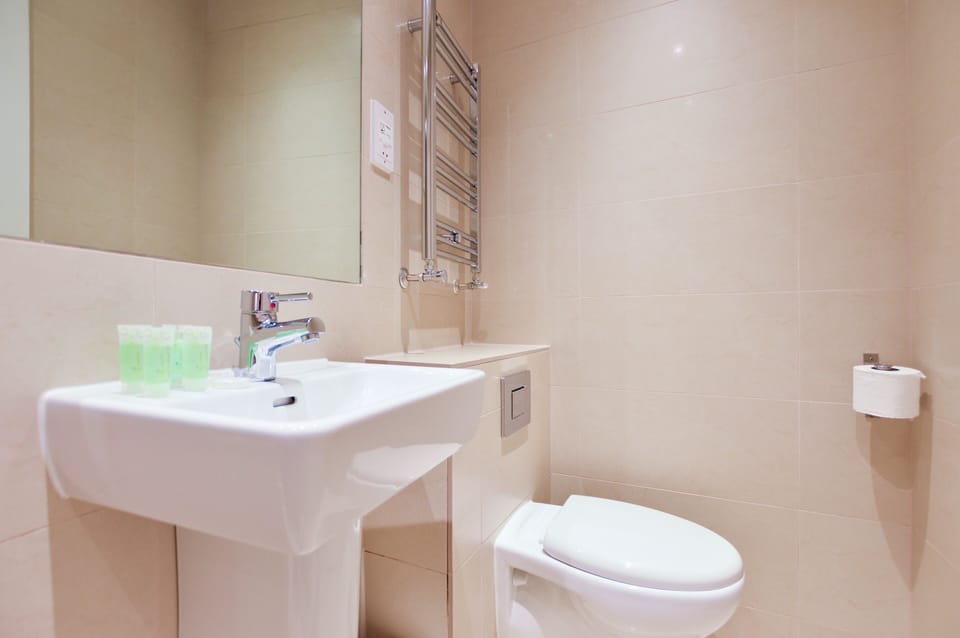 Standard Studio Apartment | Bathroom | Shower, free toiletries, hair dryer, heated floors (bathroom)