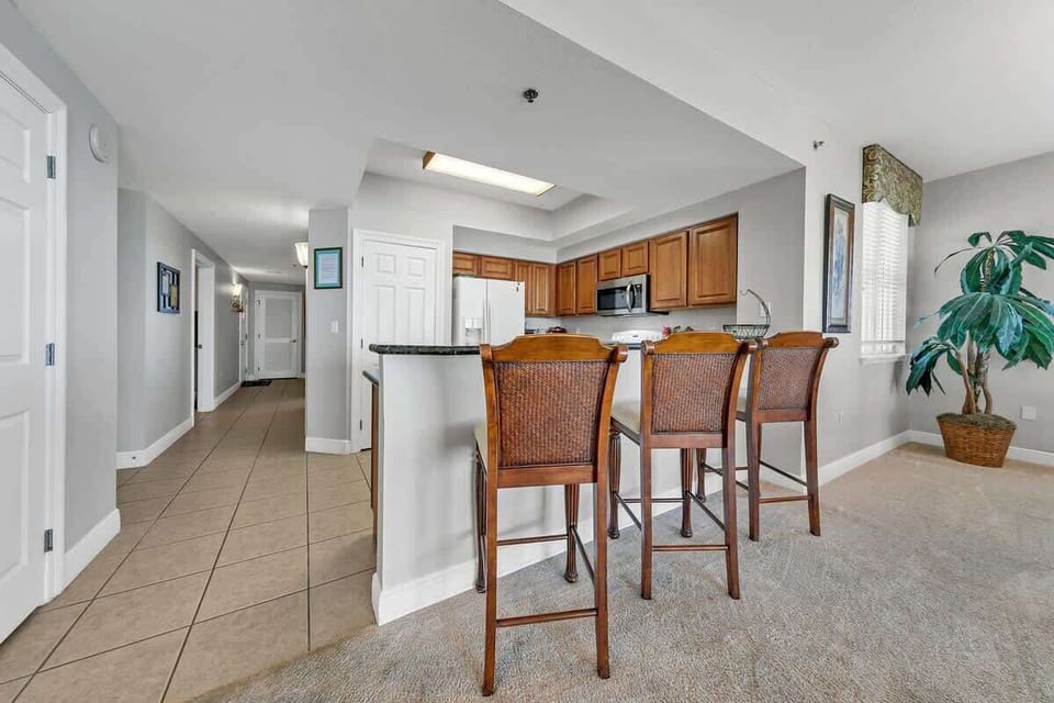 Cozy kitchen with bar seating.