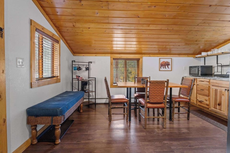 Cabin 10 is set up with a coffee maker, stove, oven, microwave, toaster and refrigerator.