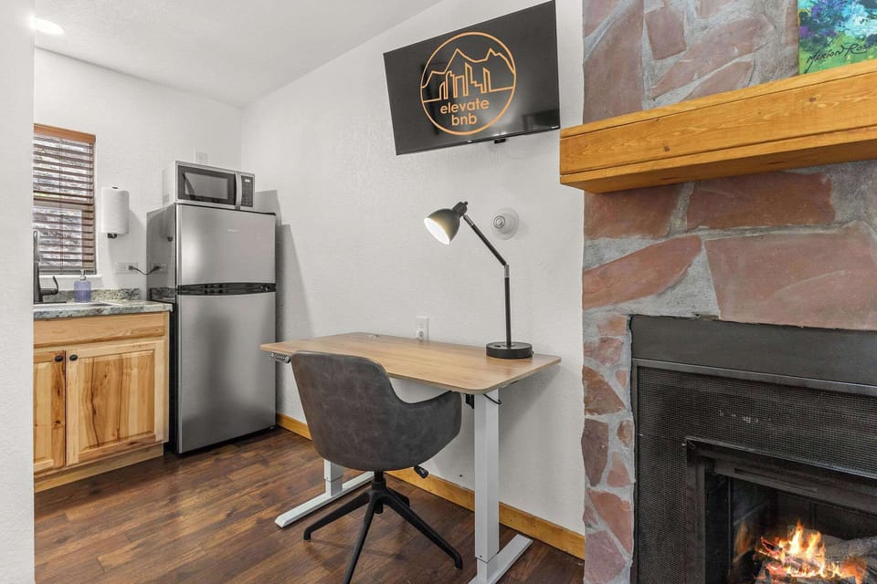The kitchen is at the back of the cabin.
