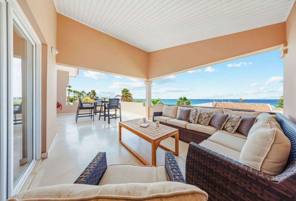 Step outside onto the second floor balcony, sit back in your favorite space, catch a breath of fresh air, and enjoy the Aruban Caribbean sun and warmth with views of the blue sea.