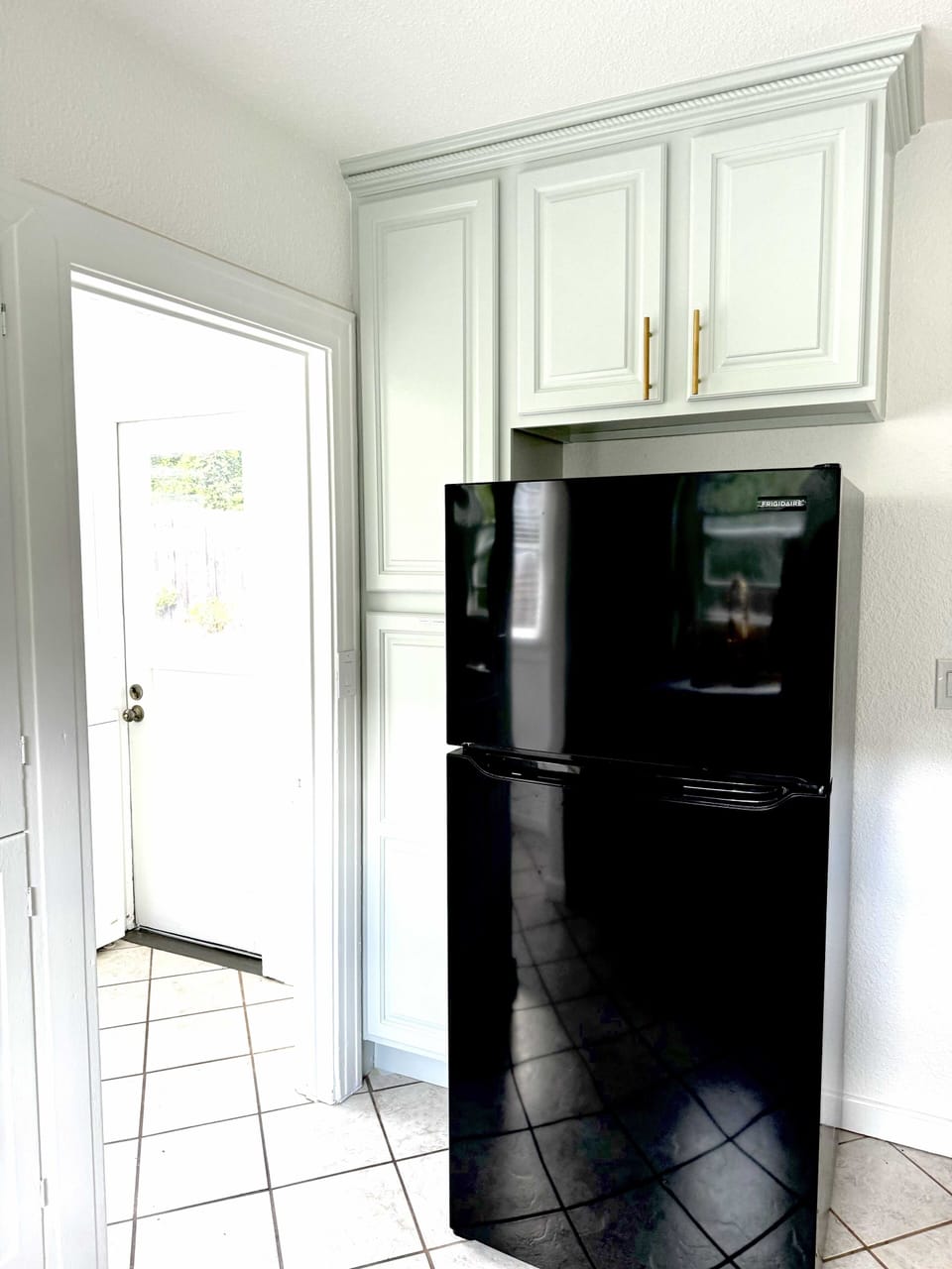 New fridge in freshly minted kitchen.