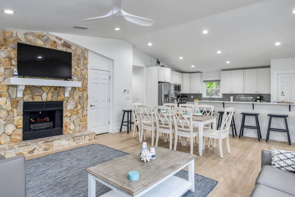 The open floor plan keeps everyone connected while enjoying different activities.