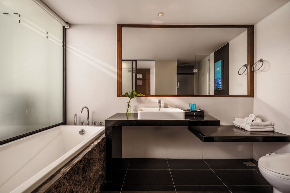 Family Room, City View | Bathroom | Free toiletries, hair dryer, slippers, bidet