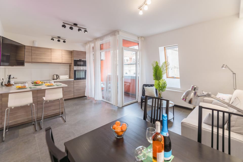 City Apartment | Living area | LCD TV