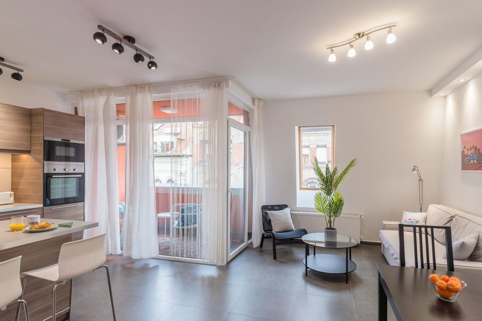 City Apartment | Living area | LCD TV