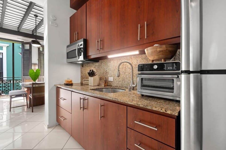 Open up the door and you are greeted by the fully equipped kitchen follow by the beautiful open living spaces.