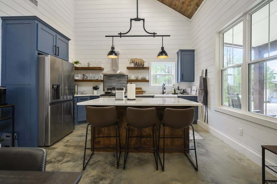 The large windows in the kitchen provide an abundance of natural light to keep things bright and airy.