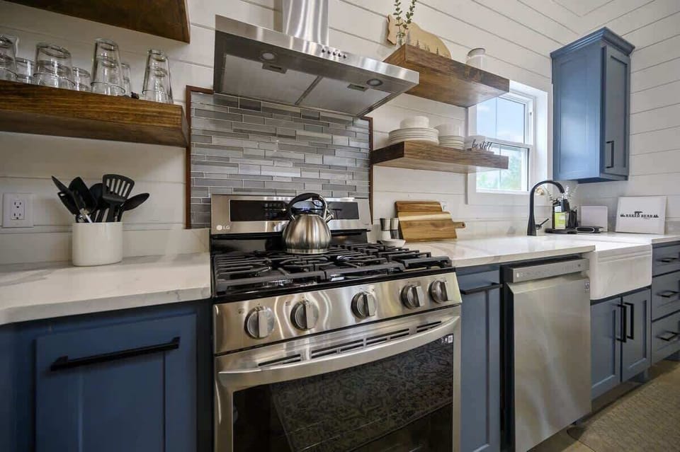 The fully-stocked kitchen includes high-end stainless-steel appliances perfect for all your cooking needs.