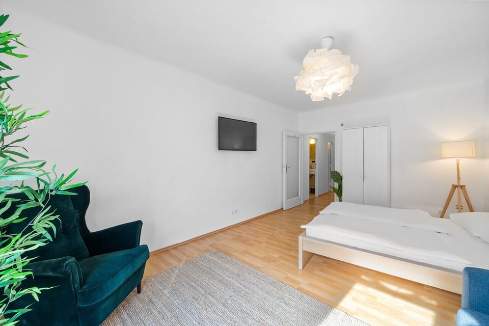 Enjoy watching TV on your comfy queen size bed.