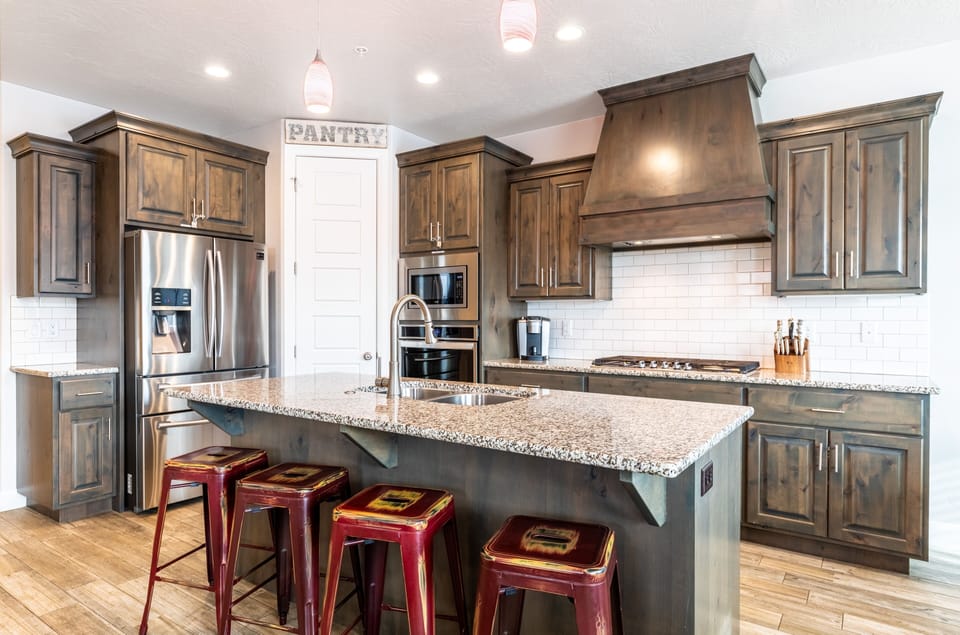 Townhome, 4 Bedrooms | Private kitchen | Fridge, oven, coffee/tea maker, toaster