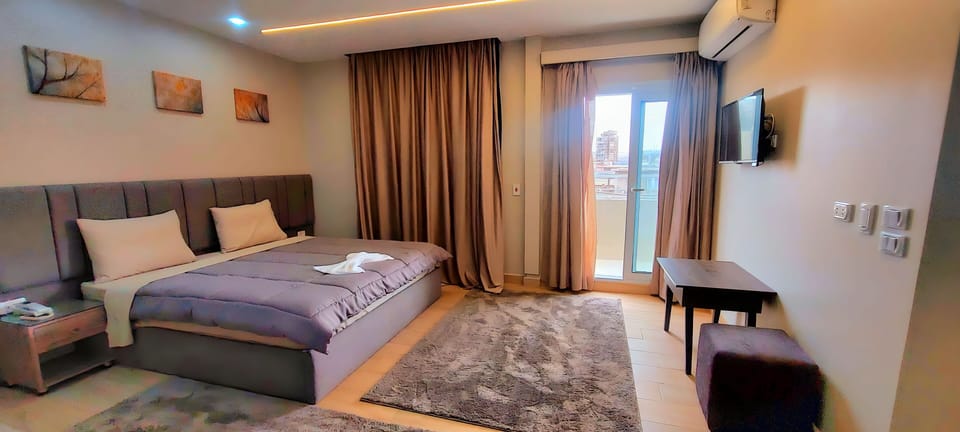 Two-Bedroom Suite with Terrace | Minibar, in-room safe, desk, laptop workspace