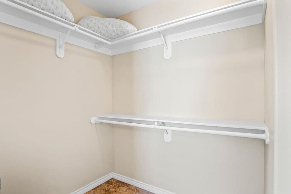 Large walk-in closet with plenty of storage space