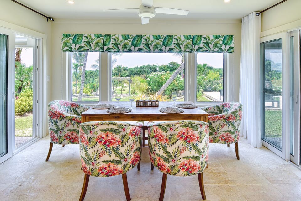 Spacious dining area, ideal for family dinners, games, or lazy summer lunches.
