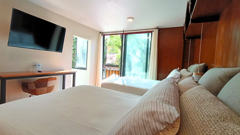 Family Room | Premium bedding, individually decorated, individually furnished, desk