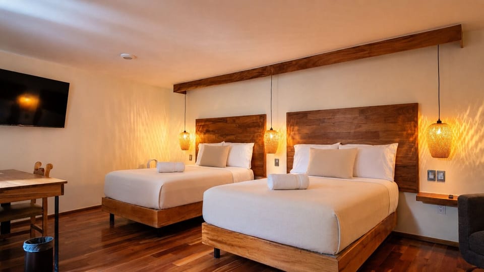 Deluxe Quadruple Room, Courtyard View | Premium bedding, individually decorated, individually furnished, desk