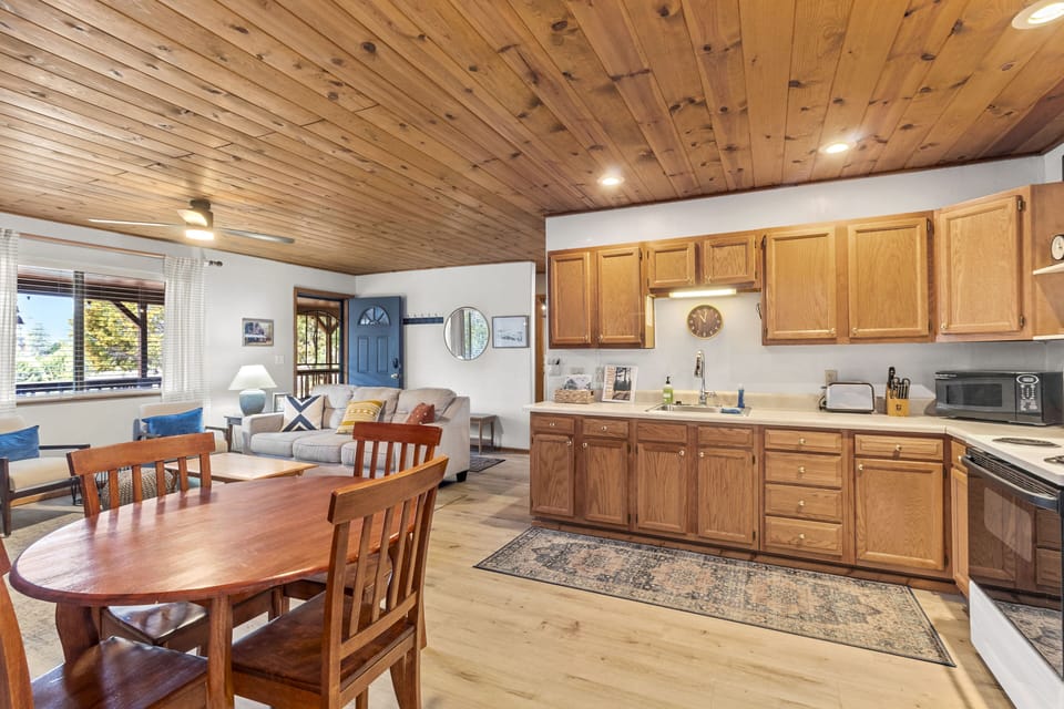 Full view of the kitchen and front room.