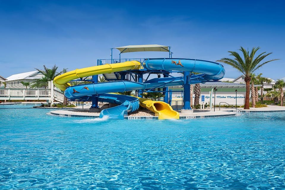 Feel the thrill of your next adventure as you spiral down the colorful waterslide.