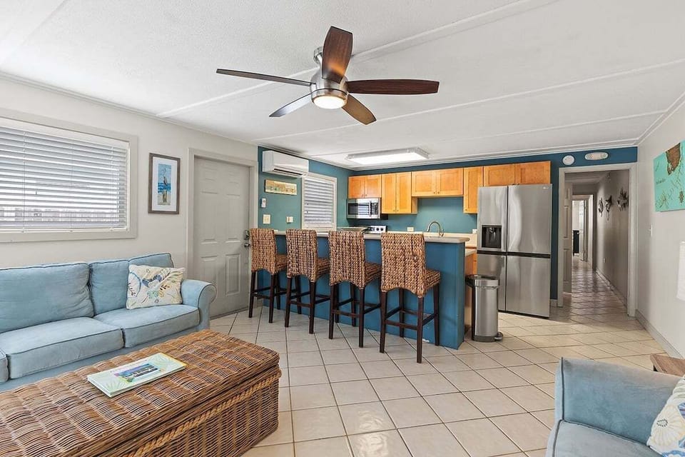 A full kitchen just steps away from the cozy living room.