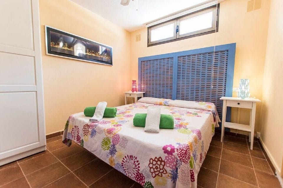 Double bedroom at Villa Gabriela, bright and comfortable, with cheerful décor and wardrobe.