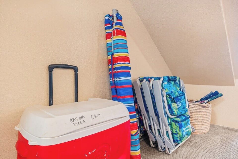 Complimentary beach gear including chairs, and cooler for your convenience