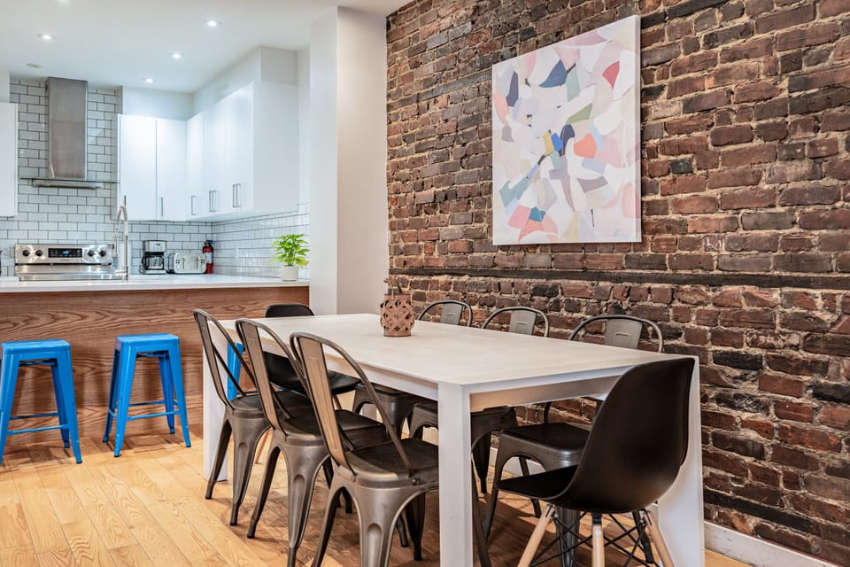 If needed, the dining table could work as a laptop-friendly workspace.