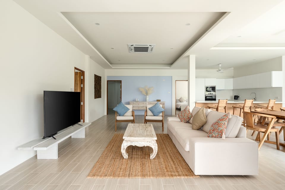 Living area with large flat screen tv.