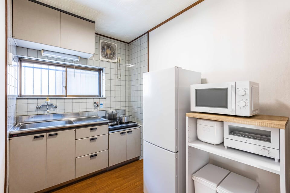 Design House | Private kitchen | Full-size fridge, microwave, stovetop, electric kettle