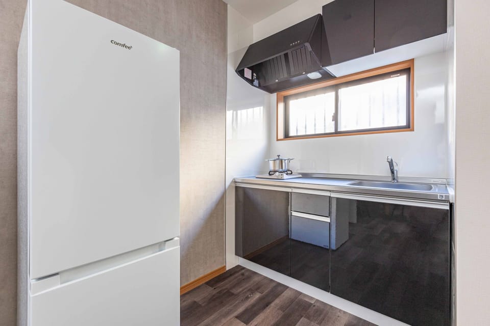 Design House | Private kitchen | Full-size fridge, microwave, stovetop, electric kettle