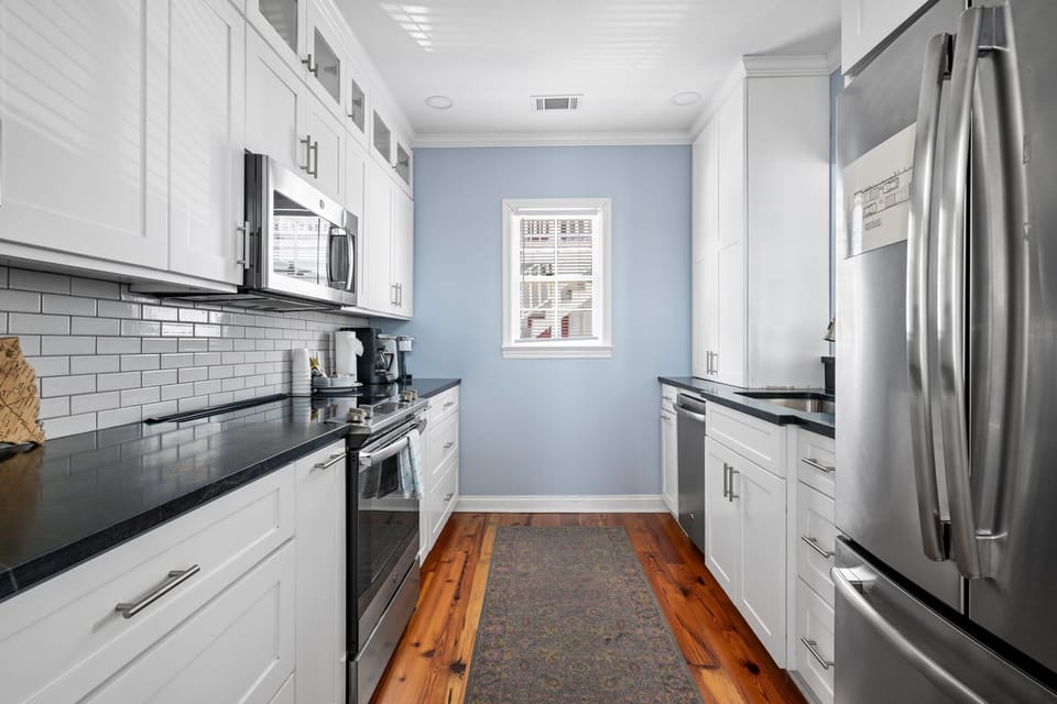 Whether you're brewing coffee or preparing a cozy dinner, this kitchen makes it feel easy.