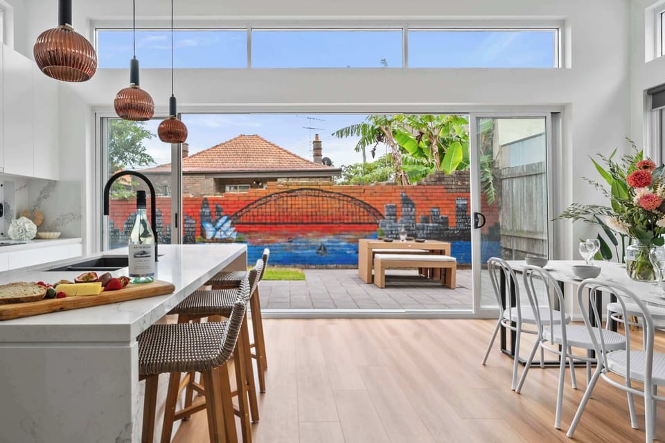 Sleek and contemporary kitchen with a stylish counter, perfect for casual dining or entertaining in effortless style.