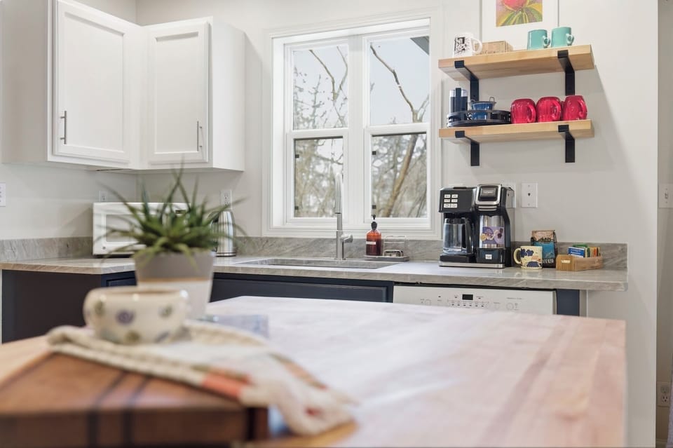 Start your day in a bright, inviting kitchen where sunlight pours in