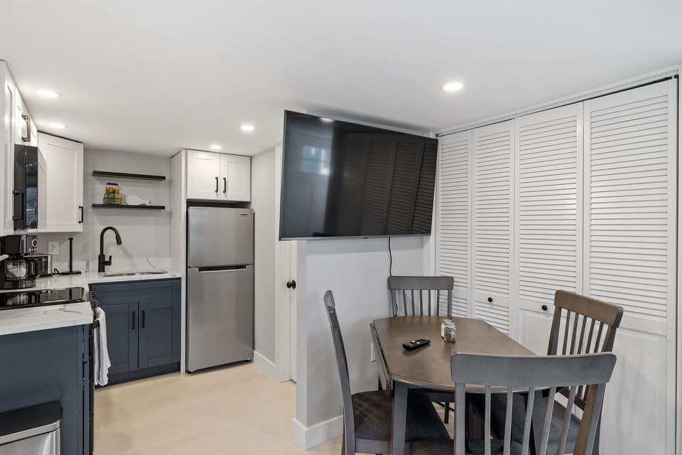 Dining room table with room for 4 guests. 