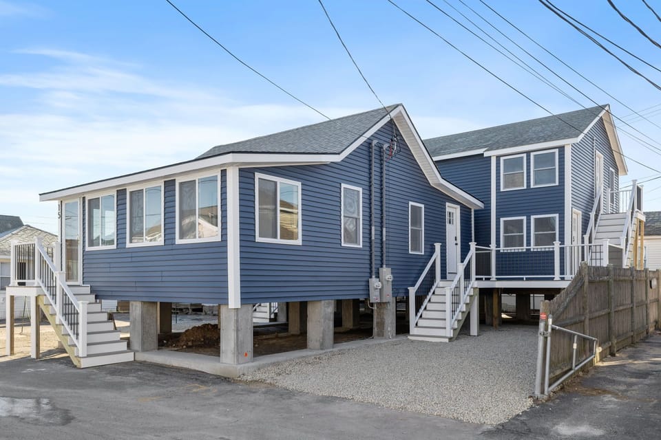Exterior of the condo. Your unit is up the first flight of stairs on the side and has a 4 on the door.