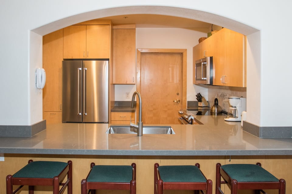 Condo, 2 Bedrooms | Private kitchen | Fridge, oven, coffee/tea maker, toaster