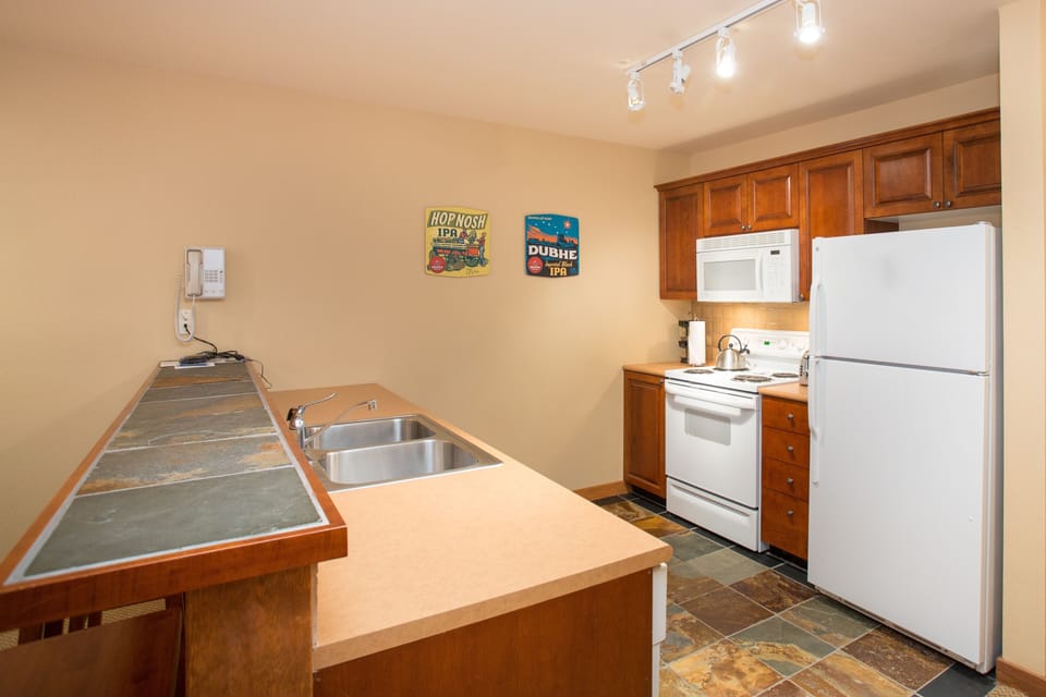 Condo, 1 Bedroom | Private kitchen | Coffee/tea maker, fridge, oven, toaster
