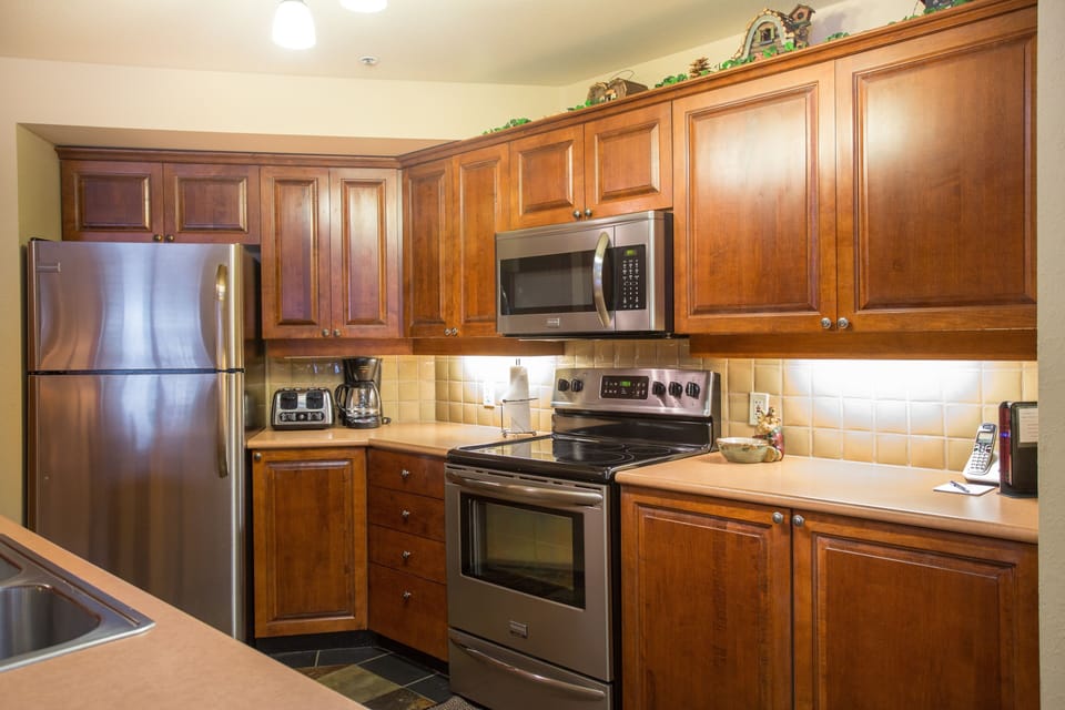 Condo, 1 Bedroom | Private kitchen | Coffee/tea maker, fridge, oven, toaster