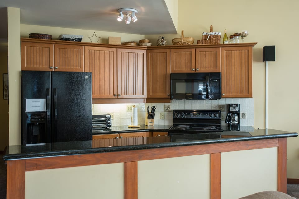 Condo, 2 Bedrooms | Private kitchen | Coffee/tea maker, fridge, oven, toaster