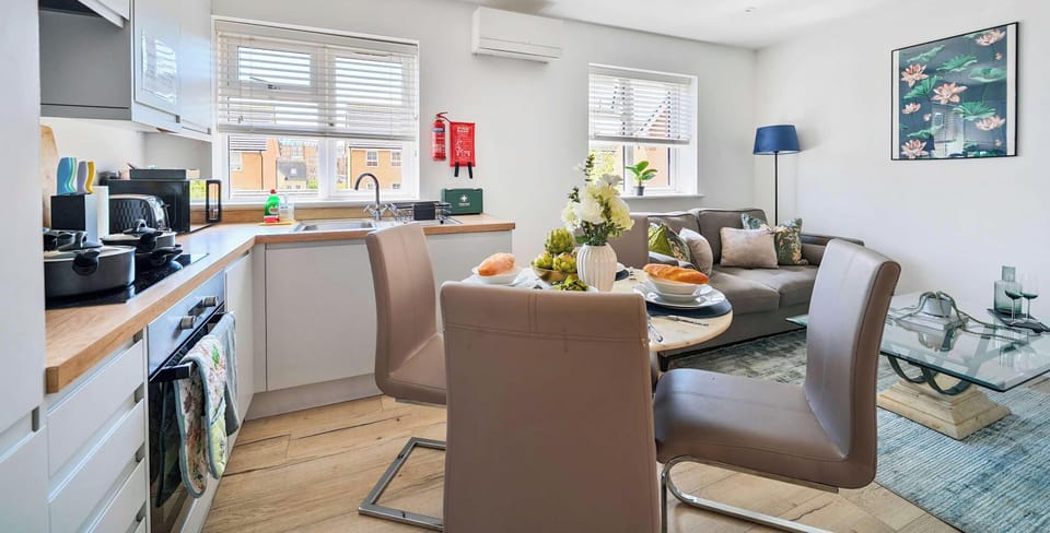 SLEEK AND MODERN KITCHEN AND DINING AREA