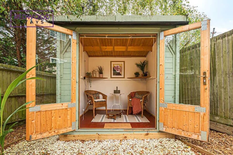 SUMMER HOUSE IN THE BACK GARDEN