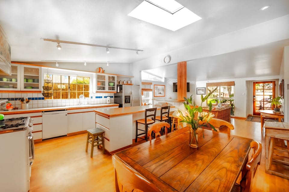 Open-concept dining and kitchen area.