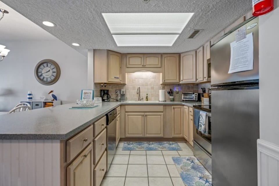 An updated kitchen makes preparing meals a breeze.