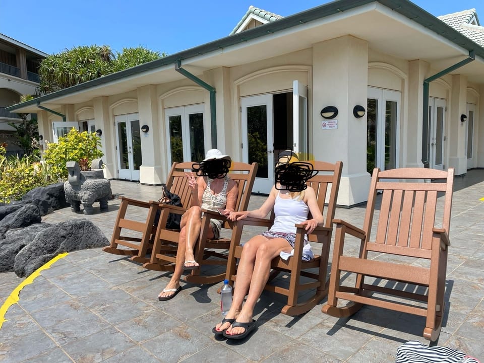 After check-in, sit in a rocking chair and enjoy the views of the ponds/resort