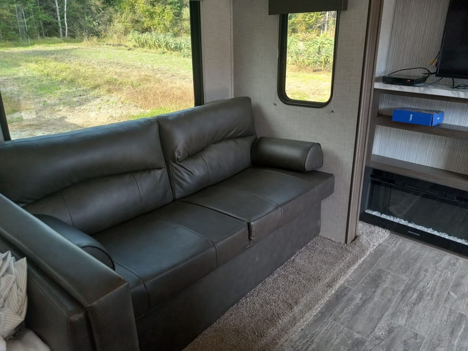 Relax on this sofa that can open to a bed!