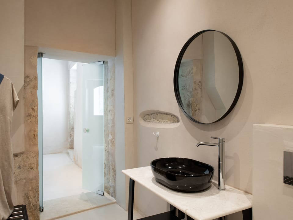 Deluxe Double Room | Bathroom | Designer toiletries, hair dryer, slippers, towels