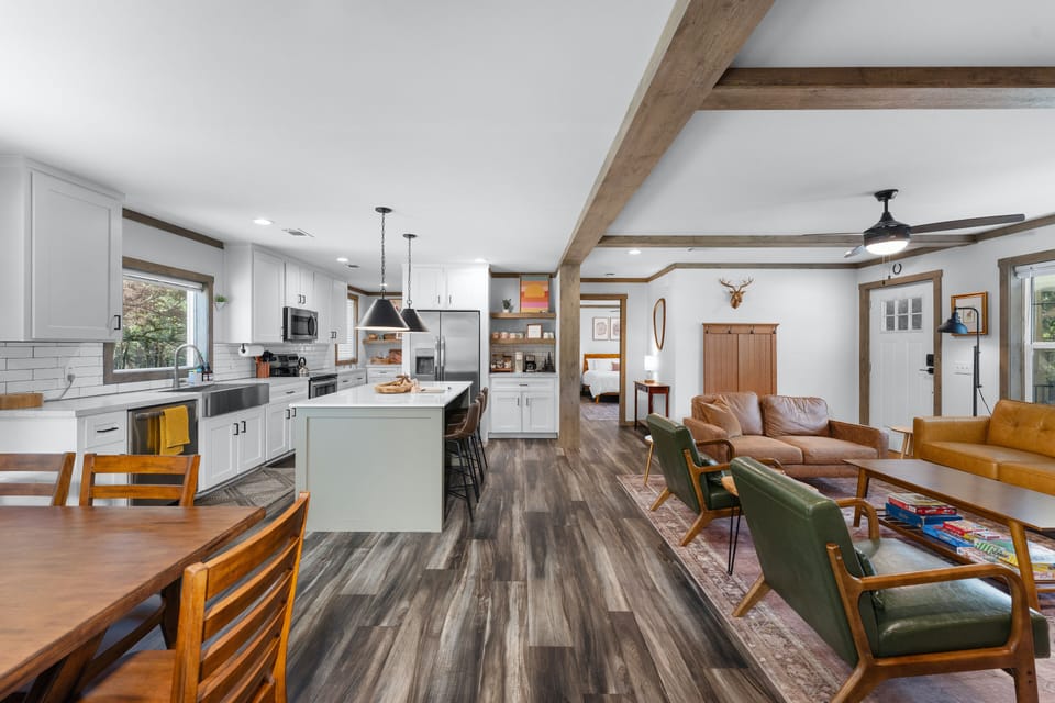 The large living space includes the dining area, the kitchen and living room.